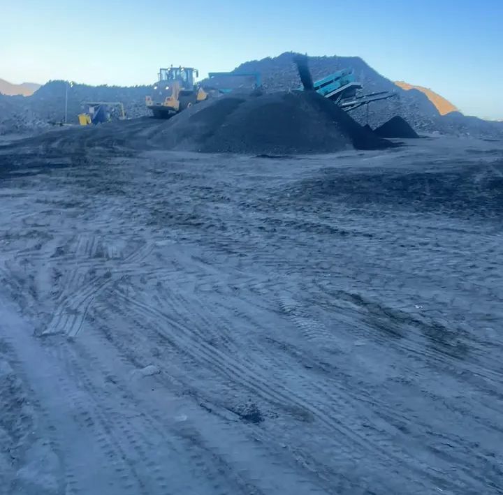Open-pit chrome mine at dawn